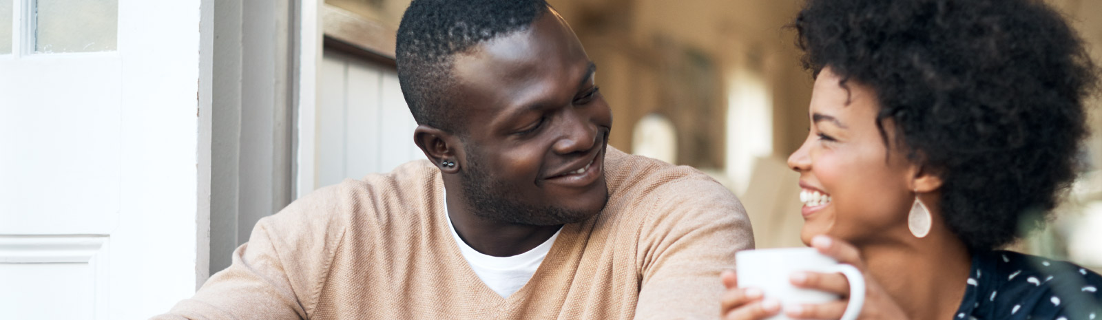 couple smiling and looking at each other